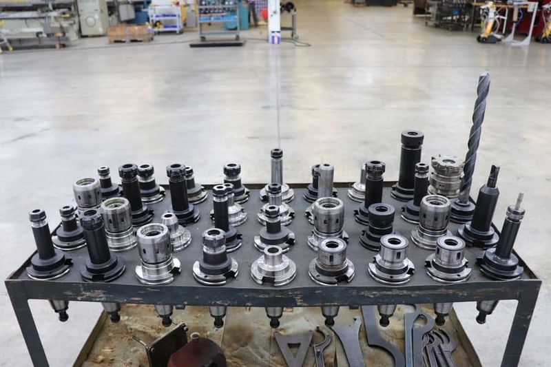 (36) Assorted CAT 50 Tool Holders in Cart