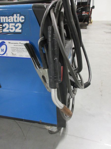Millermatic 252 MIG Wire Feed Welder with Rolling Base and Accessories, 200/230V Single Phase- Auction Item