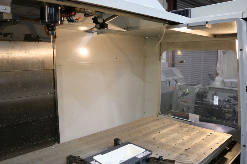 HAAS VF6D/40 VERTICAL MACHINING CENTER, NEW 2006, 15,000 RPM SPINDLE WITH THRU SPINDLE COOLANT