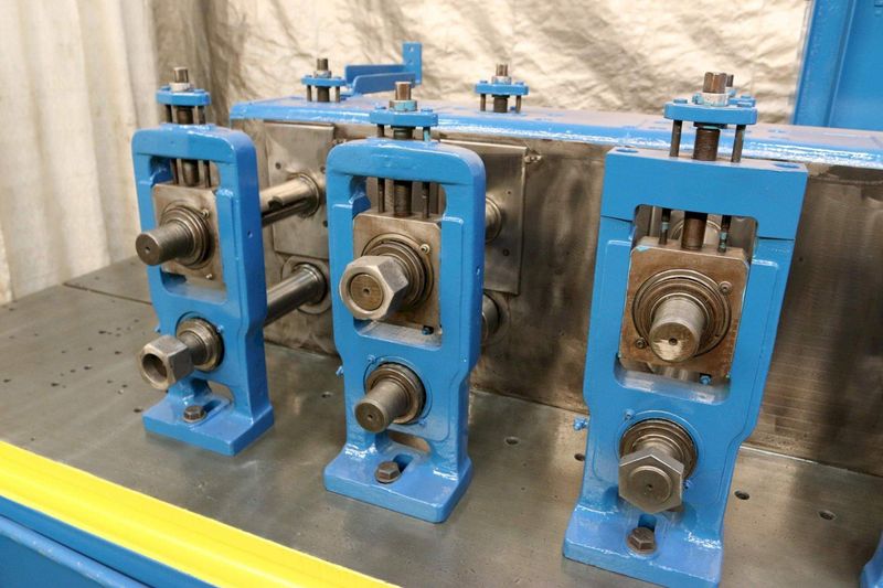 10 STAND X 2.5' TISHKEN MODEL 10HW2-1/2 ROLLFORMER: STOCK #69300