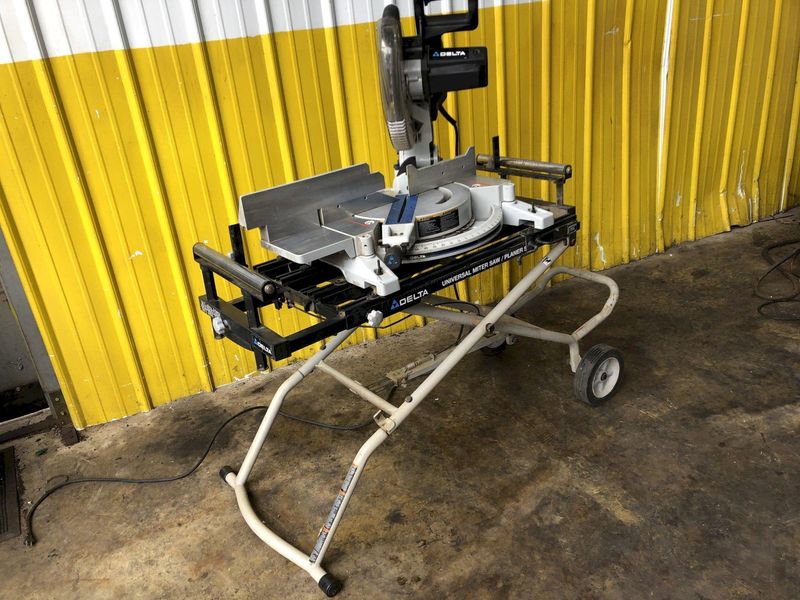 12" DELTA MODEL 36-255L COMPOUND LASER MITER SAW WITH STAND: STOCK 19214