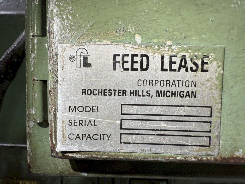 15,000 lbs. x 24" wide Feed Lease Coil Reel with Feed Lease Powered Straightener For Sale - Mode