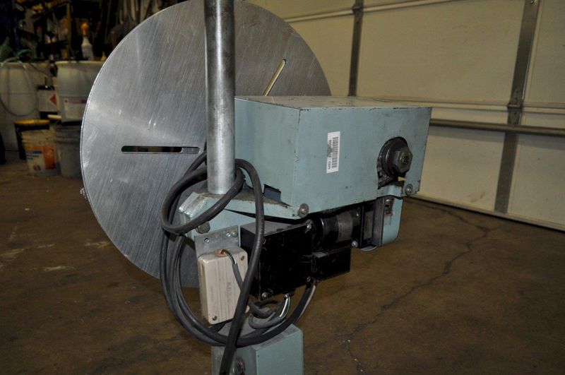 100 LB X 4" FUTABA MOTORIZED UNCOILER