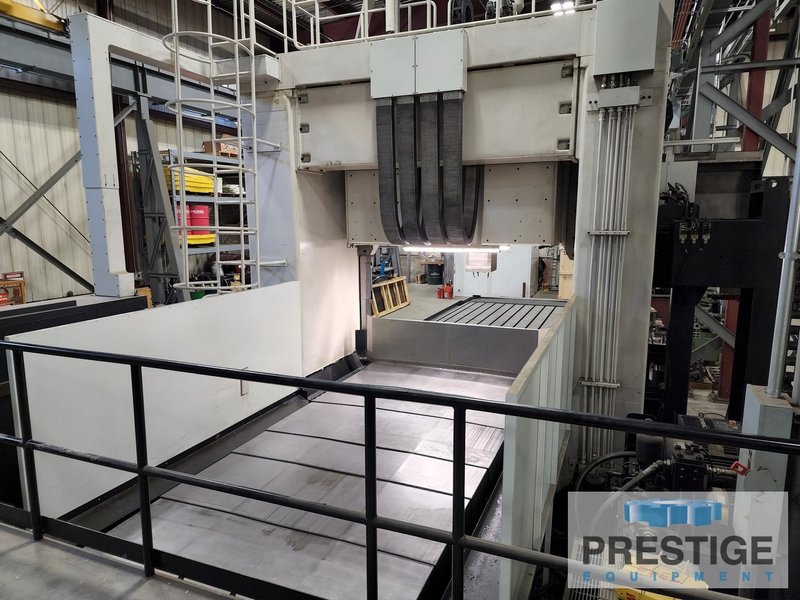 Doosan DCM-2740, X-165", Y-135", Z-27", W-43", 161" x 86" Tbl,40-ATC, 6K RPM, Elv Rail, Ang Hd.,Fanuc 18i, 2009, #31771