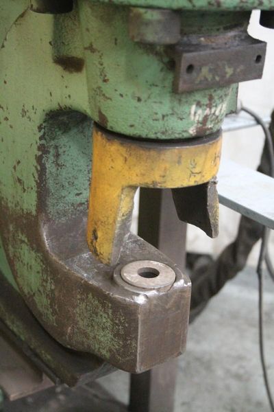 60 TON PEDDINGHAUS HYDRAULIC WEBB & FLANGE PUNCH: STOCK: 66282