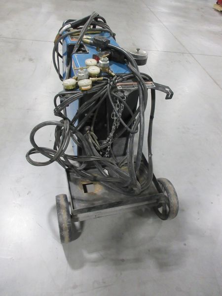 Millermatic 251 MIG Wire Feed Welder with Rolling Base and Accessories, 200/230V Single Phase- Auction Item