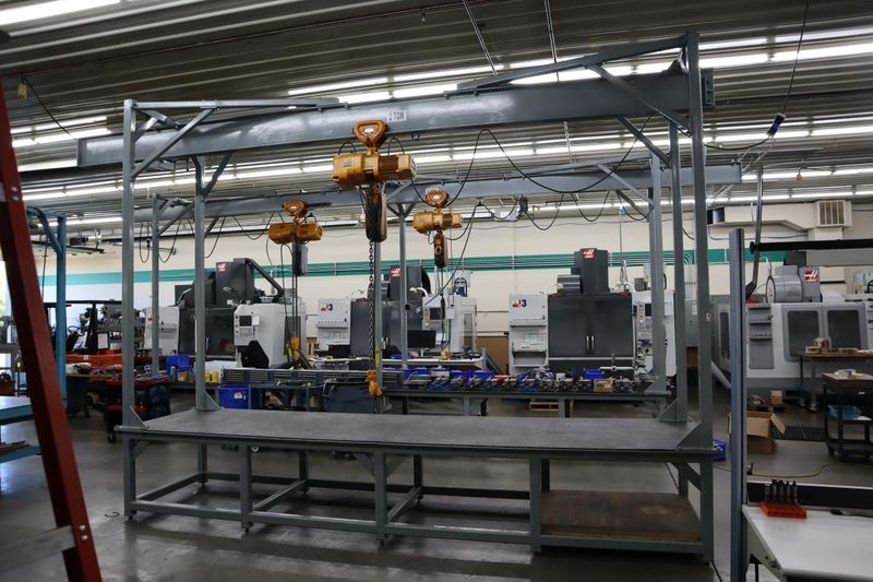 Overhead Hoist & Crane Specialists Heavy Duty Steel Mold Table with Overhead Hoist System, Harrington 2 Ton Electric Chain Hoist, I Beam, Trolley- Auction Item