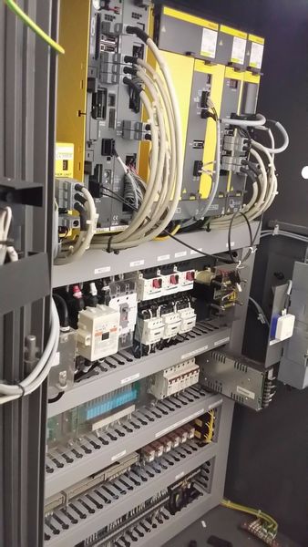 Specifications:  NC Controller: Fanuc Oi-TB Spindle Motor: 11 HP Max Spindle Speed: 3,500 RPM Taper: MT#4  Chucksize: 10" Turning Diameter: 13.79"  Machining Length: 24.80" Number of tool station: 10 Rapid Speed (X / Z) mm/min: 30/30 Max. Stroke  (X
