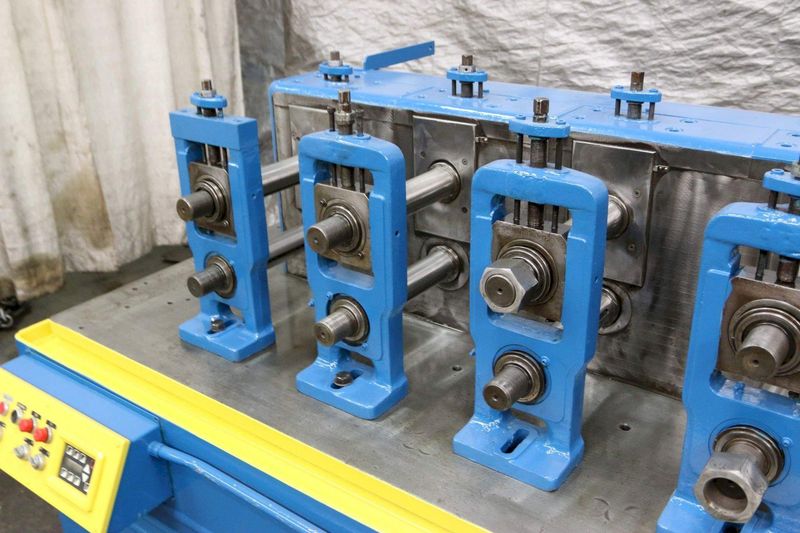 10 STAND X 2.5" TISHKEN MODEL 10HHW2-1/2 ROLLFORMER: STOCK #69301