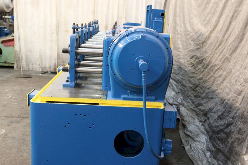 10 STAND X 2.5' TISHKEN MODEL 10HW2-1/2 ROLLFORMER: STOCK #69300
