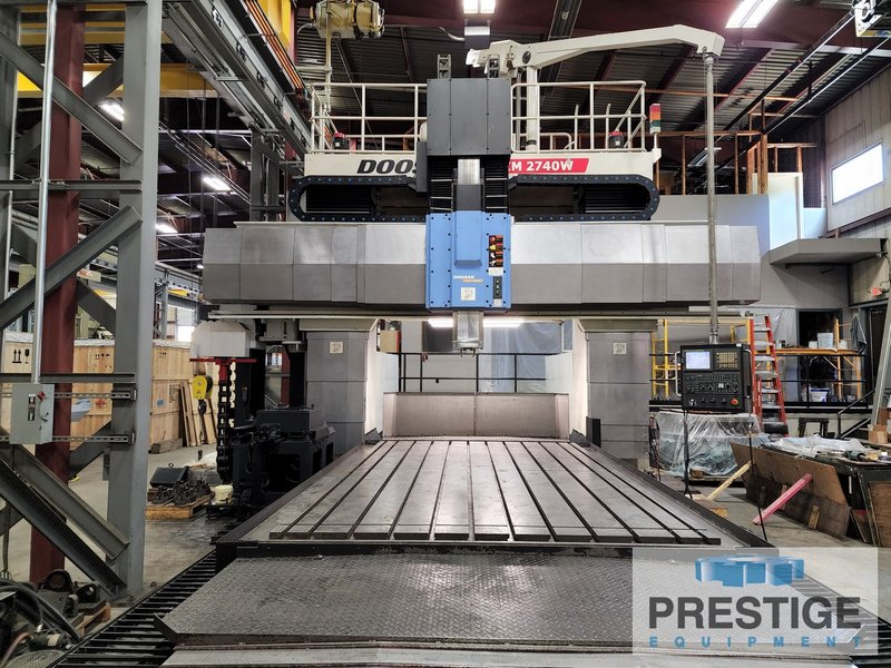 Doosan DCM-2740, X-165", Y-135", Z-27", W-43", 161" x 86" Tbl,40-ATC, 6K RPM, Elv Rail, Ang Hd.,Fanuc 18i, 2009, #31771