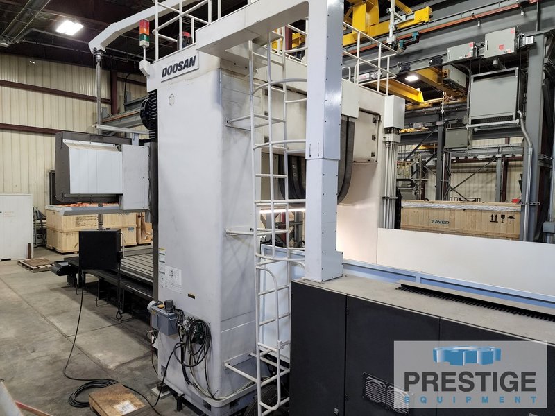 Doosan DCM-2740, X-165", Y-135", Z-27", W-43", 161" x 86" Tbl,40-ATC, 6K RPM, Elv Rail, Ang Hd.,Fanuc 18i, 2009, #31771