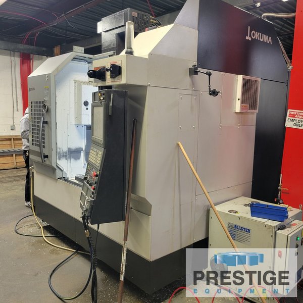 Okuma Genos M560-V, X-41", Y-22", OSP-300M, 32 ATC, Part/Tool Probe, 4th Axis Table, Chip Blaser, 2015, #43983