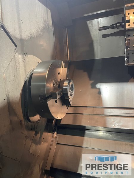 OKUMA Impact LU45 4-Axis, OSP-200L, Upper/Lower Turret, 24" 3-Jaw Chuck, Hyd. Tailstock, Chip Conveyor, Low Hours #32617