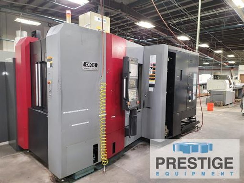 OKK HMC400, Fanuc 31i-B, X-22", Y-22", Z-27", 15.7" Pallets, B-Axis, 60 ATC, 15K RPM, TSC, Chip Conv, 2015, #32909