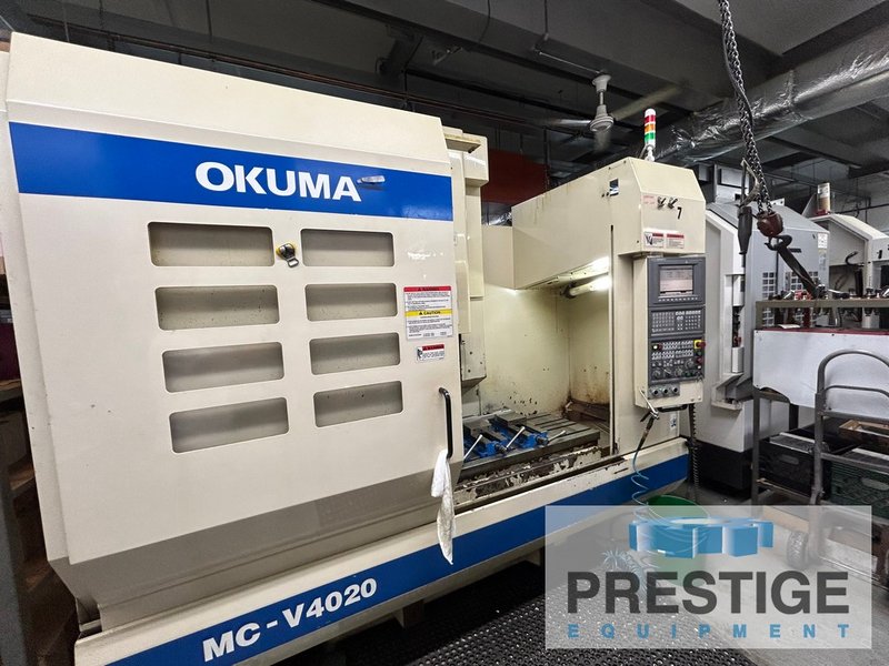 OKUMA MCV-4020, X-40", Y-20", OSP-E100M, 32 ATC, 4th Axis Ready, 15,000 RPM, CAT 40 Chip Conveyor, #43497