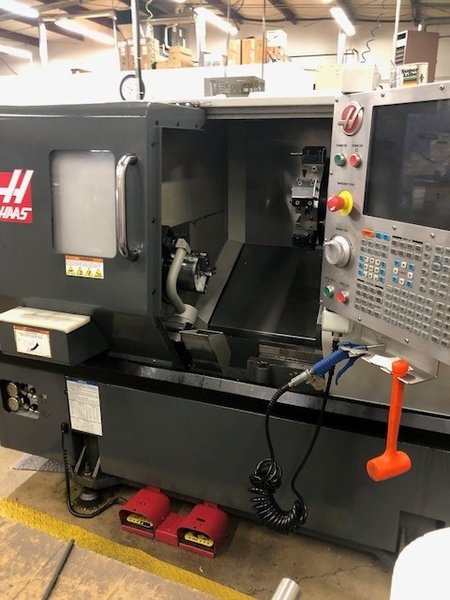 HAAS ST-10T, 1.75" Bar, 6000 RPM, 12 Tools, 15 HP, Tailstock, Tool Presetter, Chip Conveyor, Parts Catcher, Rigid Tapping, 2011