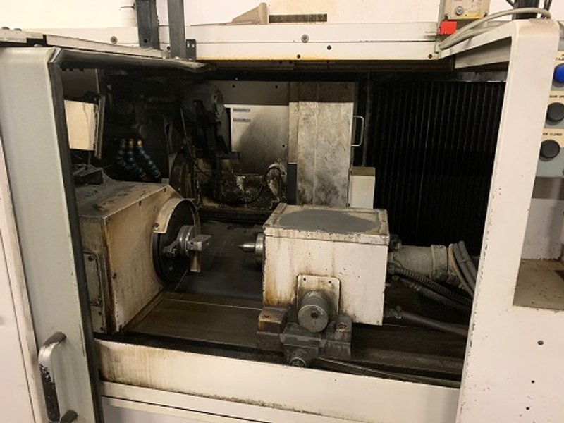 OKUMA GP-26T CNC CYLINDRICAL GRINDER, NEW 2007, 24" DIA WHEEL, 25.6" CENTER DISTANCE SHOULDER GAUGE, COOLANT, OSP U10G CNC CONTROL