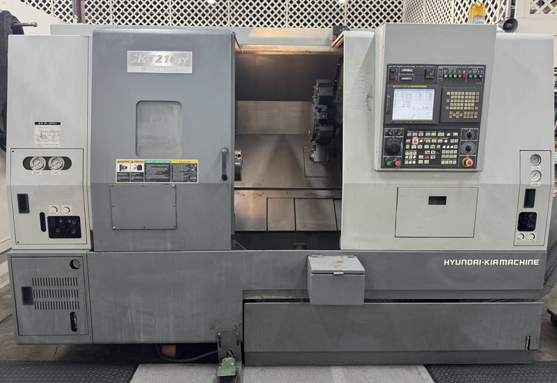 Live Tool, Sub Spindle and Y Axis.  8" chuck on main, 12 Turret, Fanuc Control, Chip Conveyor.