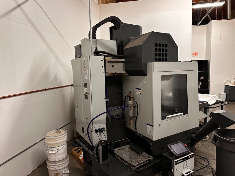 2024 HAAS VF-2SS with HC10 6-Axis Cobot with low hours.