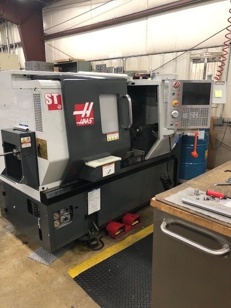HAAS ST-10T, 1.75" Bar, 6000 RPM, 12 Tools, 15 HP, Tailstock, Tool Presetter, Chip Conveyor, Parts Catcher, Rigid Tapping, 2011