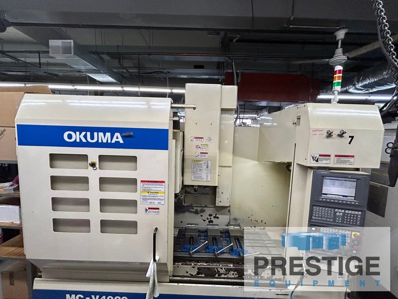 OKUMA MCV-4020, X-40", Y-20", OSP-E100M, 32 ATC, 4th Axis Ready, 15,000 RPM, CAT 40 Chip Conveyor, #43497