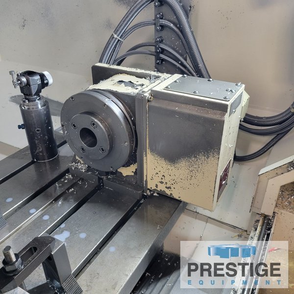 Okuma Genos M560-V, X-41", Y-22", OSP-300M, 32 ATC, Part/Tool Probe, 4th Axis Table, Chip Blaser, 2015, #43983