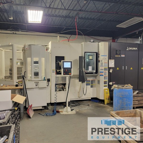 Okuma MB4000H CNC 4-Axis, X/Y-22.05, (6) Sta. APC w/ 15.7" Pallets, OSP-P300MA, 64 ATC, 15,000 RPM, Probes, 2017, #43982