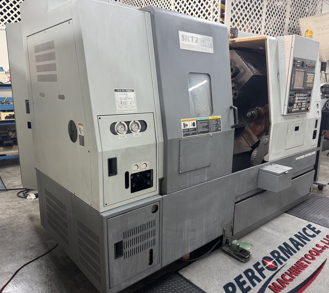 Live Tool, Sub Spindle and Y Axis.  8" chuck on main, 12 Turret, Fanuc Control, Chip Conveyor.