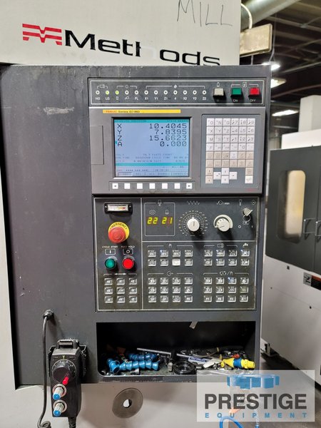 Feeler VMP-1100 4-Axis, X-43", Y-24", Z-23", 10k RPM, 23" x 47" Tbl, 4th Axis R.Tab, Fanuc 0i-MD CNC, #32911