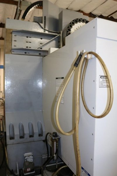HAAS VF6D/40 VERTICAL MACHINING CENTER, NEW 2006, 15,000 RPM SPINDLE WITH THRU SPINDLE COOLANT
