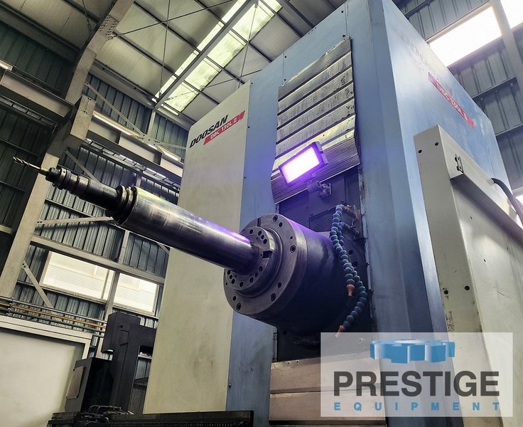 5.12" Doosan DBC-130LII, X-157", Y-98", Z-78", W-27.5",86" x 78" R.Tab, 2.5K RPM, C.T.S, 60ATC, Fanuc 31iB, 2014, #32850