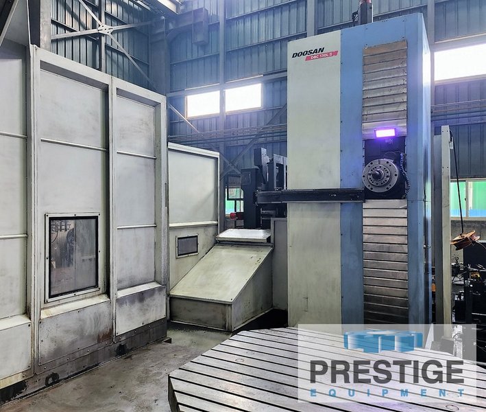 5.12" Doosan DBC-130LII, X-157", Y-98", Z-78", W-27.5",86" x 78" R.Tab, 2.5K RPM, C.T.S, 60ATC, Fanuc 31iB, 2014, #32850