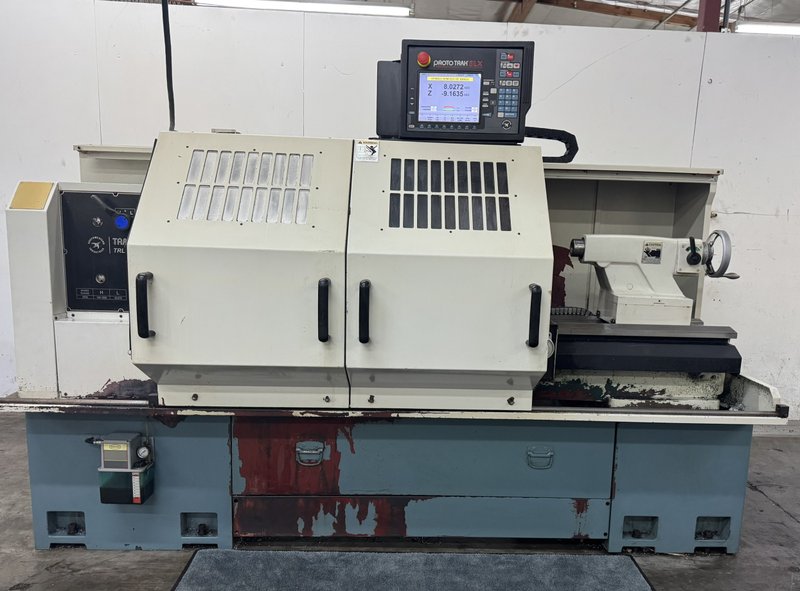 24" Swing, 60" Centers, ProtoTRAK SLX Control, Quick Change Tool Post, Tailstock, 12" 3 Jaw Chuck. Year 2014.