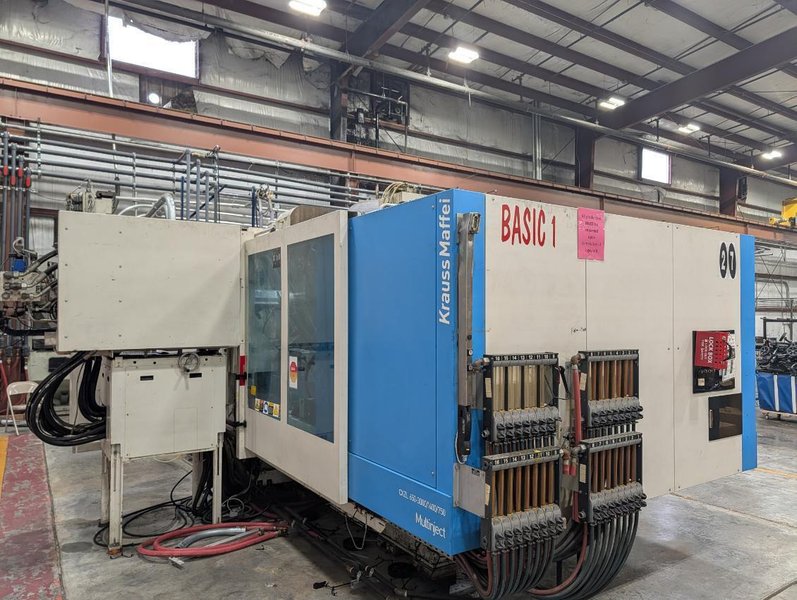650 TON KRAUSS MAFFEI CXZL 650-3000/1400/750  THREE SHOT INJECTION MOLDING MACHINE, 2010