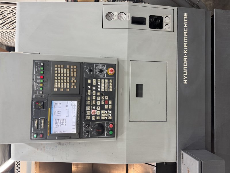 Live Tool, Sub Spindle and Y Axis.  8" chuck on main, 12 Turret, Fanuc Control, Chip Conveyor.