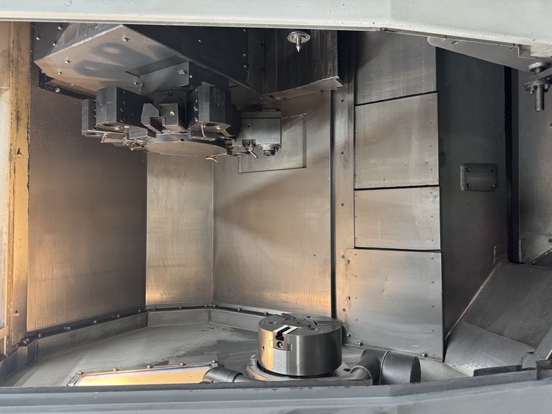 Live Tool, Sub Spindle and Y Axis.  8" chuck on main, 12 Turret, Fanuc Control, Chip Conveyor.