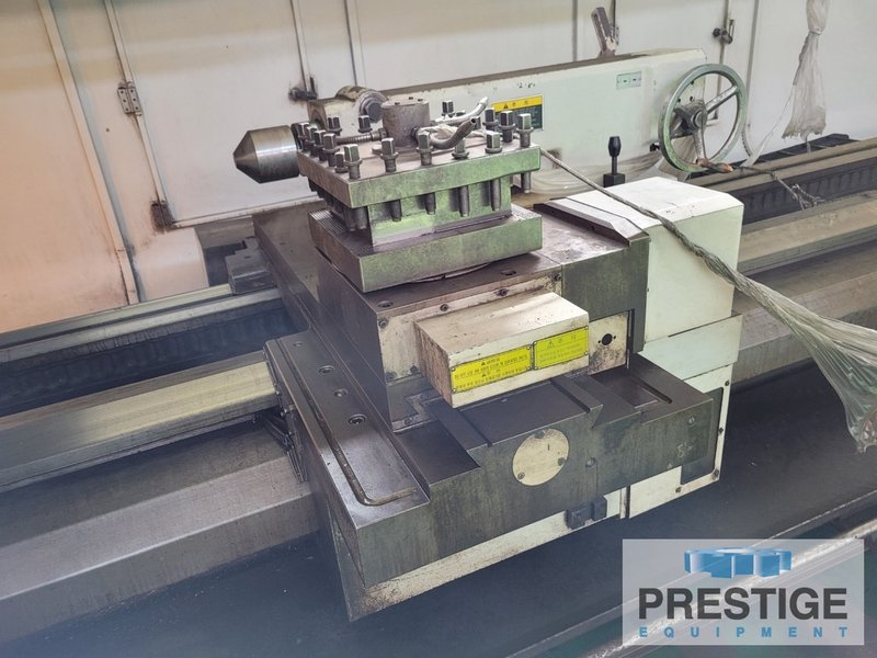 Hankook Hanturn-75 x 6000, 30" x 236", Fanuc 32i CNC, 18" Chuck, (2) Steady Rests, Chip Conveyor, 2012, #31904