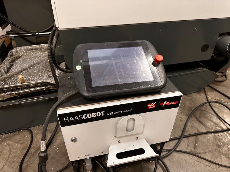 2024 HAAS VF-2SS with HC10 6-Axis Cobot with low hours.
