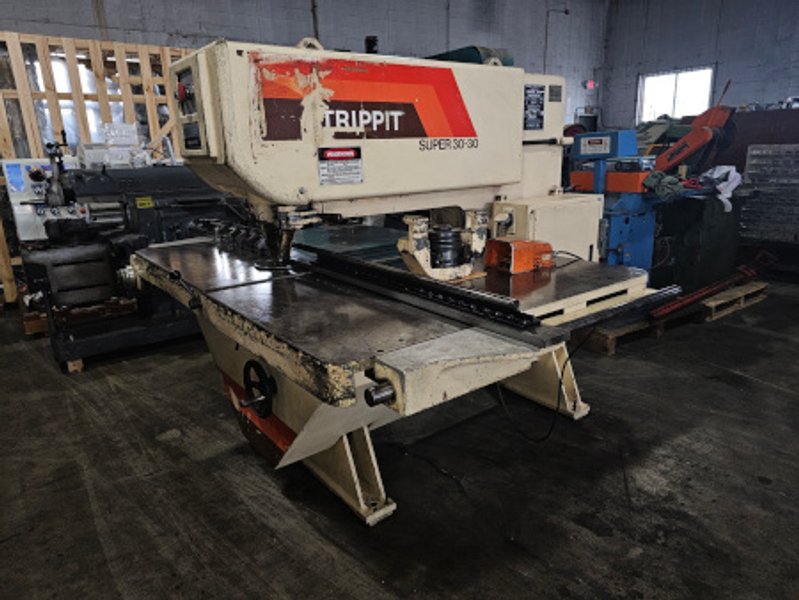 30 Ton, STRIPPIT, #3030, 1-1/4" & 3-1/2" holders, gauging, tooling, 1990   Our stock number: 7195