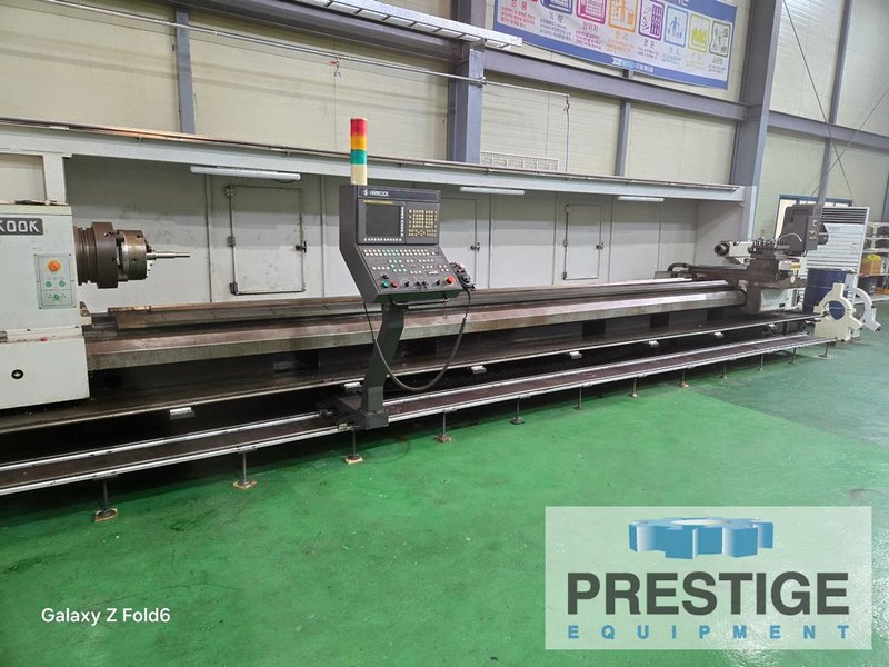 Hankook Hanturn-75 x 6000, 29.5" swing, 236" cc, 1,250 RPM, Fanuc 21i CNC, 24 HP, (2) Steadies, (2) Chucks, 2012, #44023