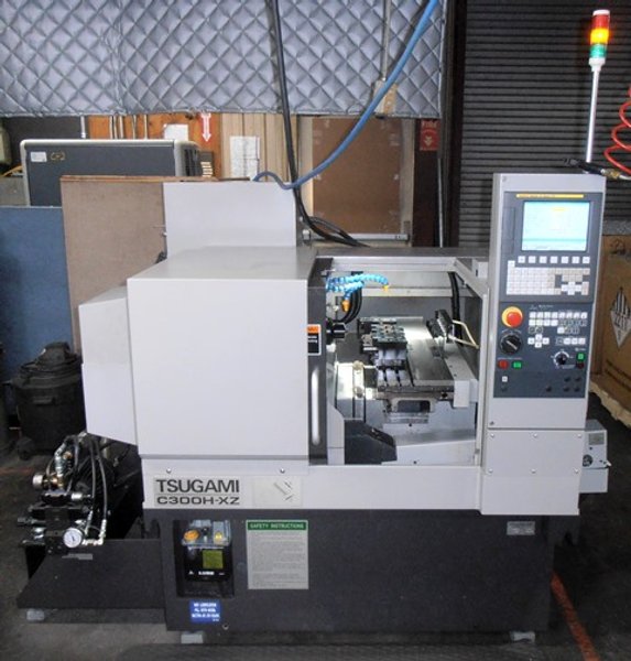 Tsugami C300H-XZ, Fanuc 0i Mate-TD, 80-6,000 RPM, 7.3/10 Hp, 1.5" Max. Bar Cap, 5C Hyd. Collet Chk, 4.5"x20.5" Tool Stage, Parts Catcher, Parts Conveyor, Misc Tool Holders, Coolant Manifold, 2015, Put In Service 2017, 129 Hours, Aluminum and Plastic
