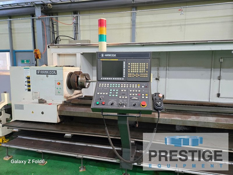 Hankook Hanturn-75 x 6000, 29.5" swing, 236" cc, 1,250 RPM, Fanuc 21i CNC, 24 HP, (2) Steadies, (2) Chucks, 2012, #44023