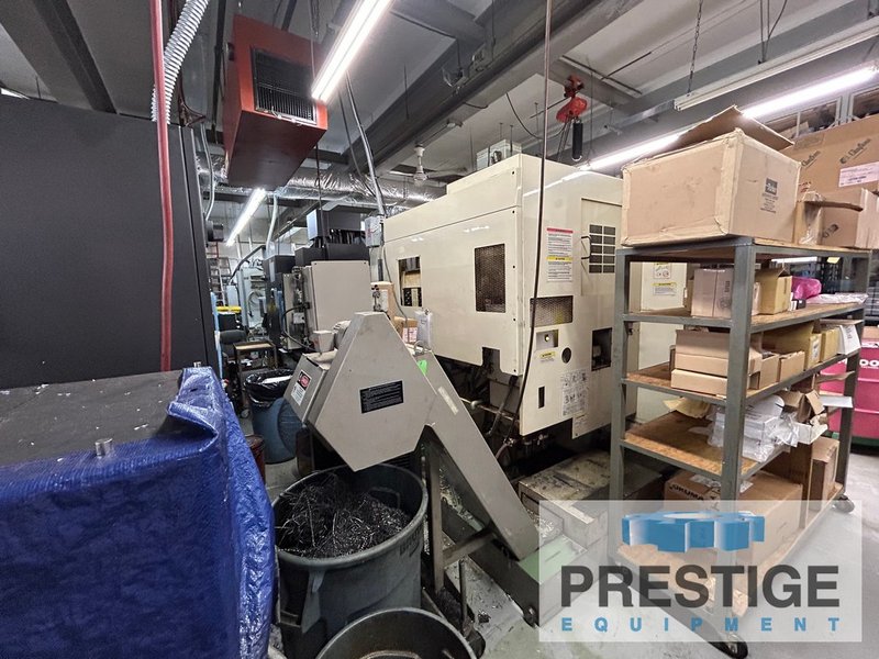 OKUMA MCV-4020, X-40", Y-20", OSP-E100M, 32 ATC, 4th Axis Ready, 15,000 RPM, CAT 40 Chip Conveyor, #43497