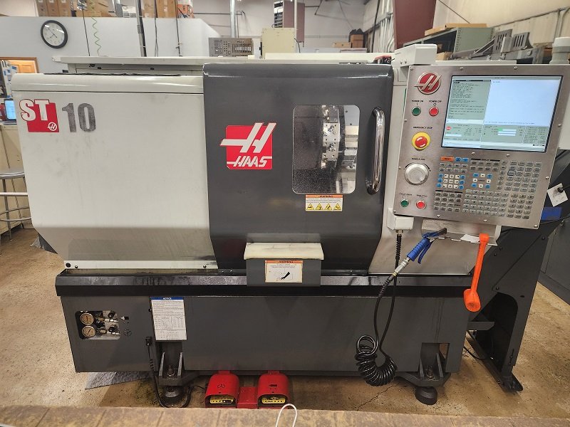 HAAS ST-10T, 1.75" Bar, 6000 RPM, 12 Tools, 15 HP, Tailstock, Tool Presetter, Chip Conveyor, Parts Catcher, Rigid Tapping, 2011